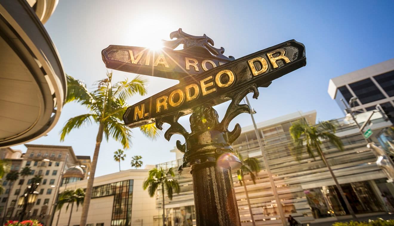 Rodeo Drive road marker in the Beverly Hills shopping district of Los Angeles California USA