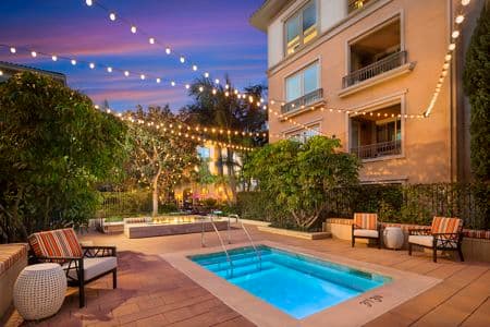 Exterior view of pool at Malibu - Villas Playa Vista Apartment Homes in Los Angeles, CA.