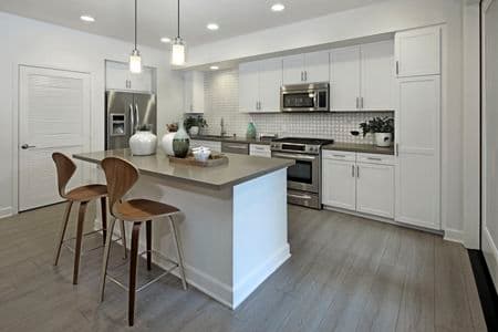 Interior view of kitchen at Malibu - Villas Playa Vista Apartment Homes in Los Angeles, CA.