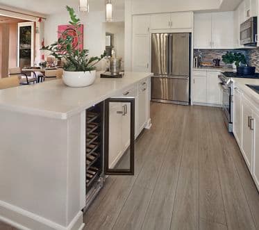 Interior view of kitchen at Montecito - Villas at Playa Vista Apartment Homes in Los Angeles, CA.