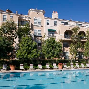 Exterior view of pool at Cherry Orchard Apartment Homes in Sunnyvale, CA.
