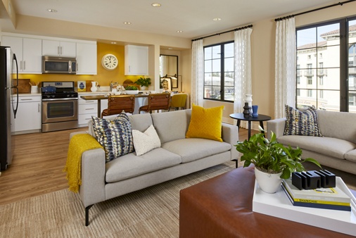 Interior view of Living Room and Kitchen at Crescent Village Apartment Homes in San Jose, CA.