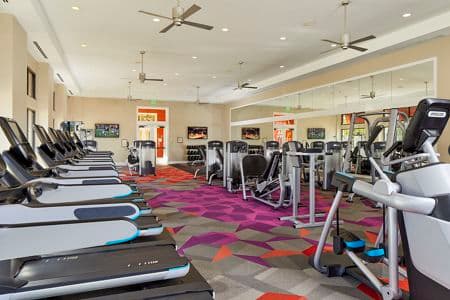 Interior view of Fitness Center at Crescent Village Apartment Homes in San Jose, CA.