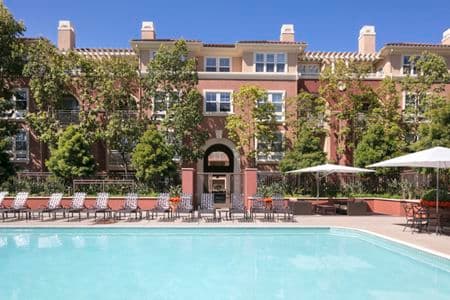 Exterior view of pool at Franklin Street Apartment Homes in Redwood City, CA.