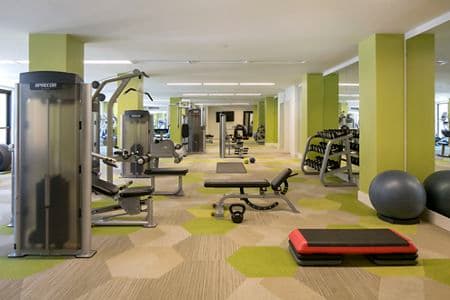 Interior view of fitness center at Franklin Street Apartment Homes in Redwood City, CA.
