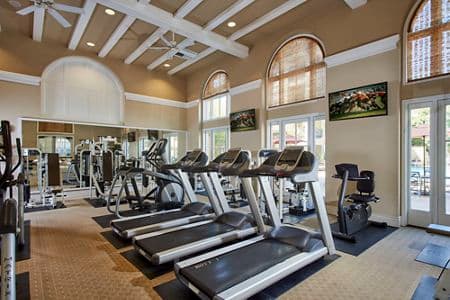 Interior view of the fitness center at The Oaks at North Park Apartment Homes in San Jose, CA.