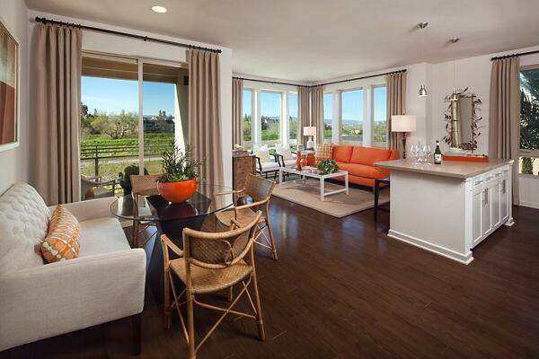 Interior view of living room and dining room at River View Apartment Homes in San Jose, CA.