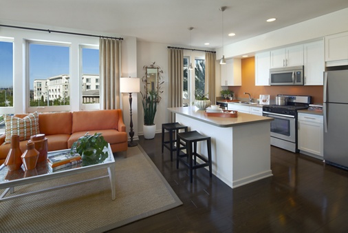 Interior view of living room and kitchen at River View Apartment Homes in San Jose, CA.