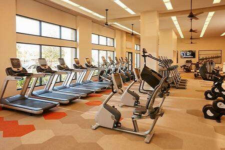 Interior view of fitness center at River View Apartment Homes in San Jose, CA.