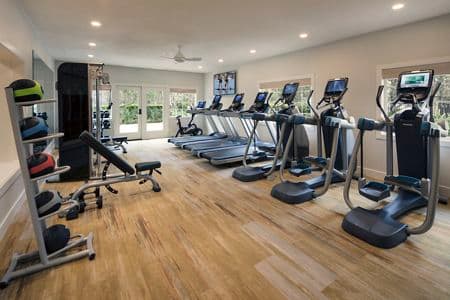 Interior view of fitness center at Aliso Town Center Apartment Homes in Aliso Viejo, CA.