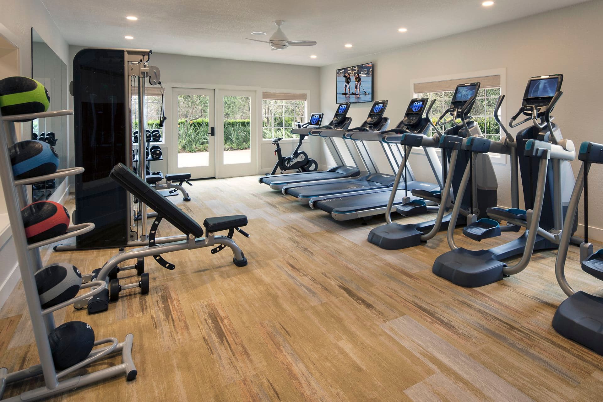 Interior view of fitness center at Aliso Town Center Apartment Homes in Aliso Viejo, CA.