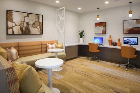 Interior view of ilounge at  Aliso Town Center Apartment Homes in Aliso Viejo, CA.