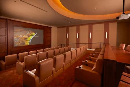 Interior view of movie theater at The Enclave at South Coast Apartment Homes in Costa Mesa, CA.