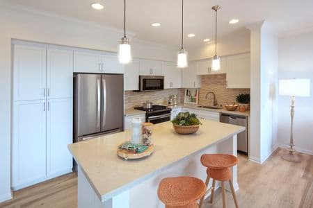 Interior view of kitchen at Anacapa Apartment Homes in Irvine, CA.