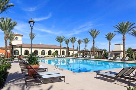 Exterior view of pool at Avella Apartment Homes in Irvine, CA.