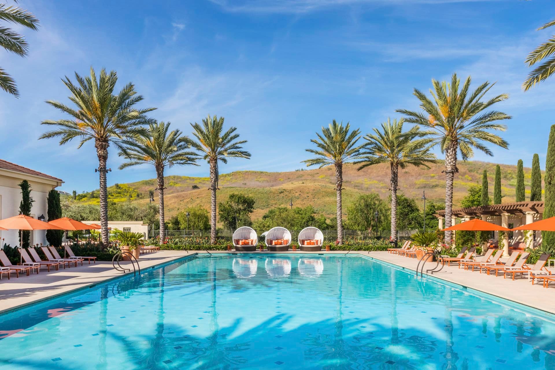 Exterior pool view at Los Olivos at Irvine Spectrum Apartment Homes in Irvine, CA.