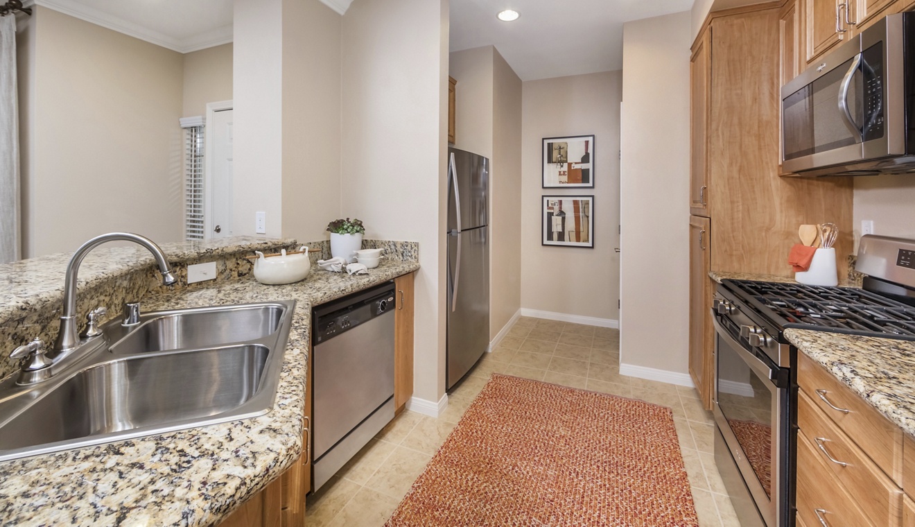 Interior view of kitchen at Mirasol Apartment Homes in Stonegate, Irvine, CA.