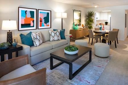 Interior view of living room and dining room at Northwood Place Apartment Homes in Irvine, CA.