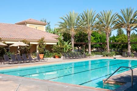 Exterior view of pool at Oak Glen Apartment Homes in Irvine, CA.