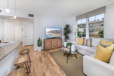 Interior view of  living room Palmeras Apartment Home in Irvine, CA.