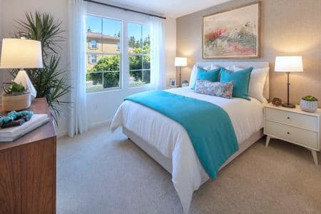 Interior view of bedroom at Palmeras Apartment Homes in Irvine, CA.