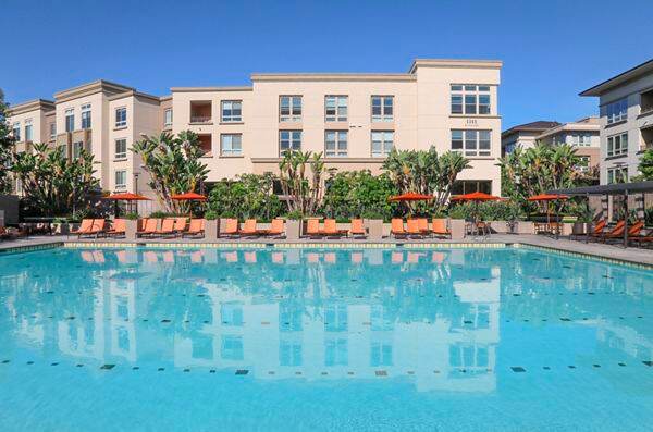 Exterior view of pool at Park Place Apartment Homes in Irvine, CA.