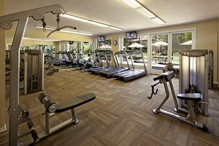 Interior view of fitness center at Park West Apartment Homes in Irvine, CA.