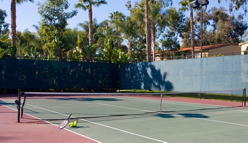 Exterior view of tennis court at Park West Apartment Homes in Irvine, CA.