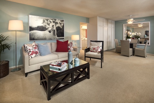 Interior view of living room and dining room at Parkwood Apartment Homes in Irvine, CA.