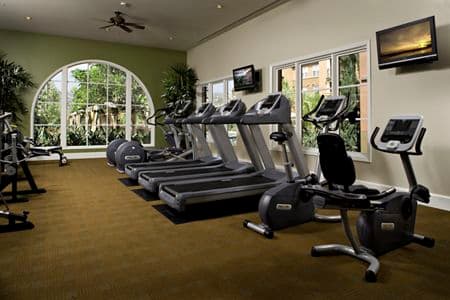 Interior view of fitness center at Portola Place Apartment Homes in Irvine, CA.