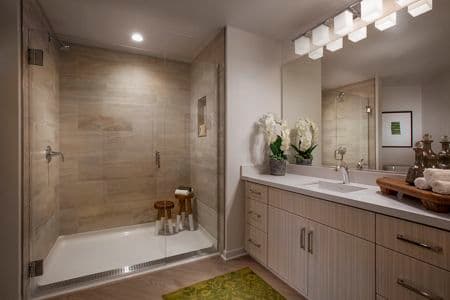 Interior view of bathroom at Promenade Apartment Homes in Irvine, CA.