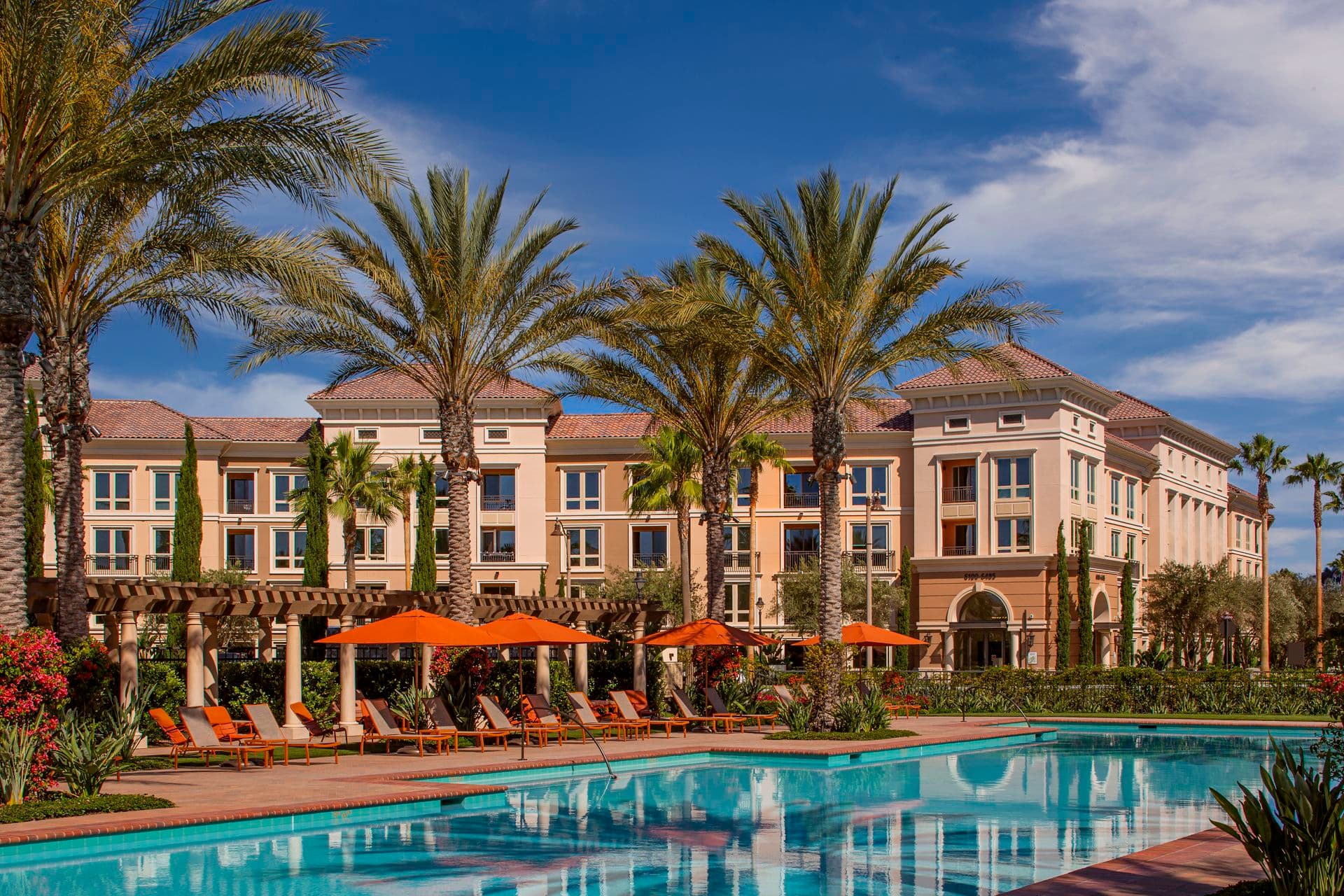 Exterior view of pool at Promenade Apartment Homes in Irvine, CA.