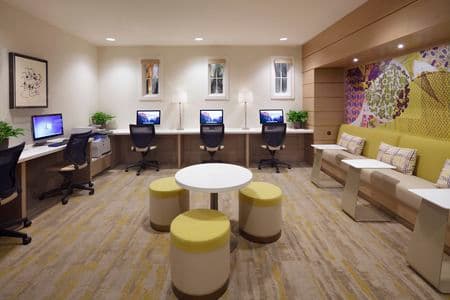 Interior view of business center iLounge at Quail Hill Apartment Homes in Irvine, CA.