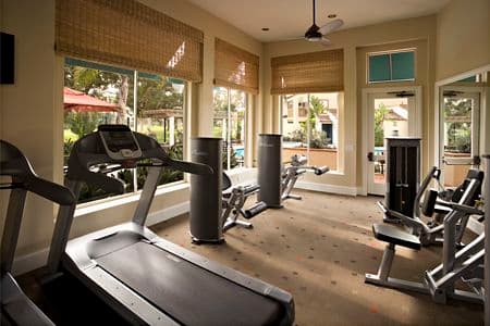 Interior view of fitness center at Rancho San Joaquin Apartment Homes in Irvine, CA.
