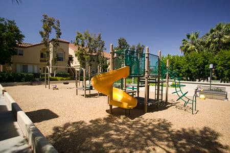 Exterior view of children's play area at San Carlo Villa in Irvine, CA.