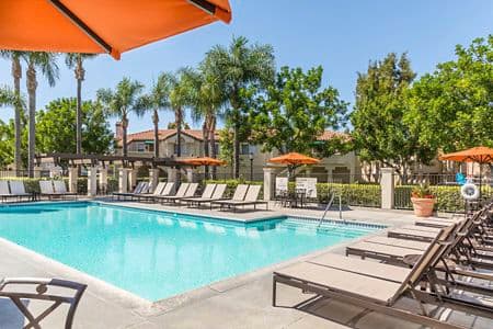 Daytime pool view of San Carlo Villa Apartment Homes in Irvine, CA.