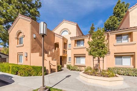 Exterior view of San Leon Villa Apartment Homes in Irvine, CA.
