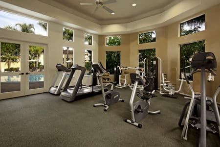 Interior view of fitness center at San Paulo Apartment Homes in Irvine, CA.