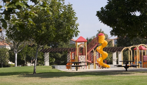 Exterior view of playground at San Remo Villa Apartment Homes in Irvine, CA.