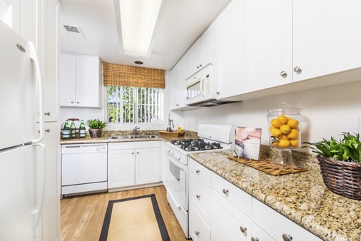 Interior view of kitchen at Santa Maria Apartment Homes in Irvine, CA.