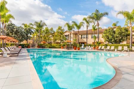 Exterior view of the pool at Santa Rosa Apartment Homes in Irvine, CA.