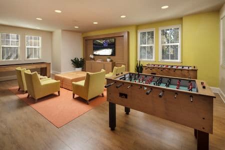 Interior view of game room at Solana Apartment Homes in Irvine, CA.