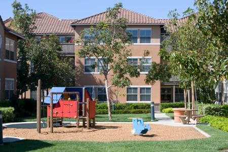 Exterior view of playground at Sonoma Apartment Homes at Oak Creek in Irvine, CA.