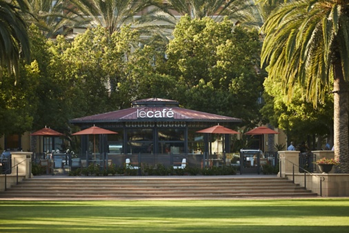 Exterior view of Le Cafe at The Park at Irvine Spectrum Apartment Homes in Irvine, CA.
