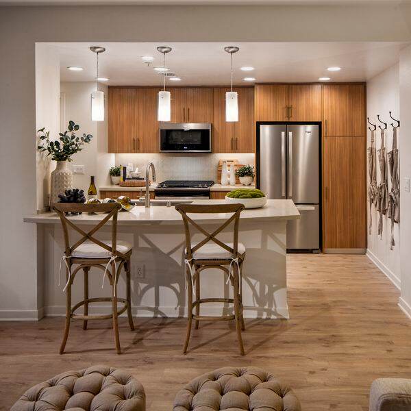 Interior view of kitchen at Delrey at The Village at Irvine Spectrum Apartment Homes in Irvine, CA.