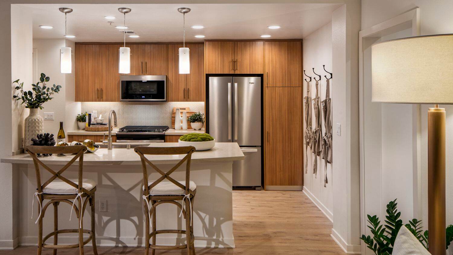 Interior view of kitchen at Delrey at The Village at Irvine Spectrum Apartment Homes in Irvine, CA.