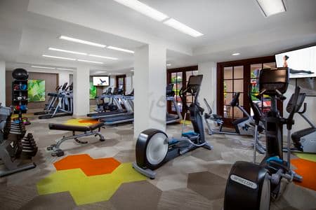 Interior view of fitness center at Mirador at The Village at Irvine Spectrum Apartment Homes in Irvine, CA.
