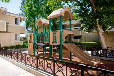 Exterior view of playground at Turtle Rock Vista Apartment Homes in Irvine, CA.
