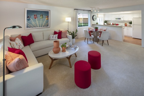 Interior view of living room, dining room and kitchen at Turtle Rock Vista Apartment Homes in Irvine, CA.