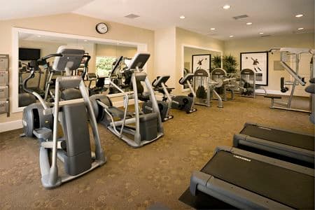 Interior view of fitness center at Turtle Rock Vista Apartment Homes in Irvine, CA.